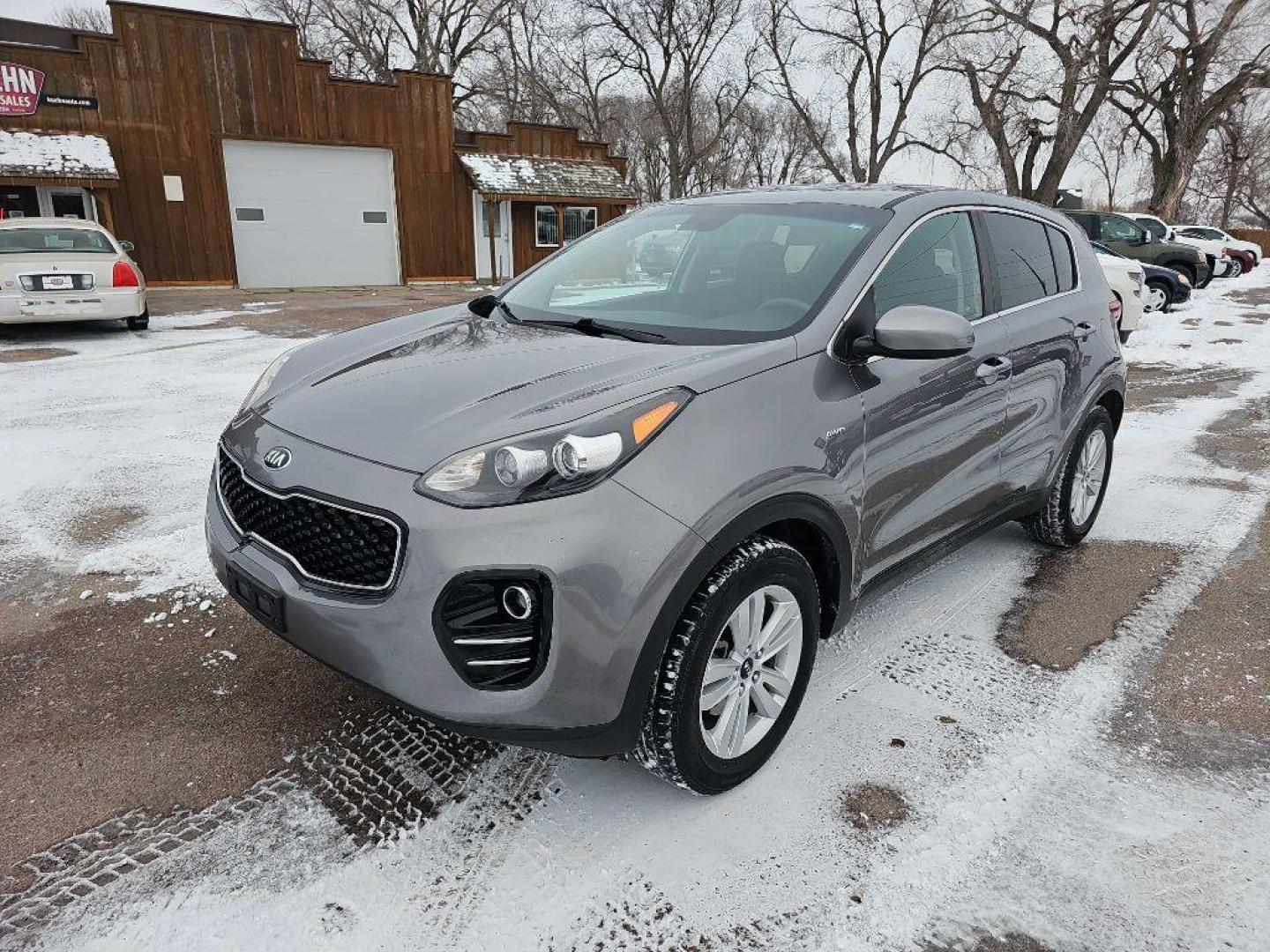 2017 SILVER KIA SPORTAGE LX (KNDPMCAC6H7) with an 2.4L engine, Automatic transmission, located at 495 Old Highway 20 West, South Sioux City, NE, 68776, (402) 494-2677, 42.458408, -96.443512 - Photo#0