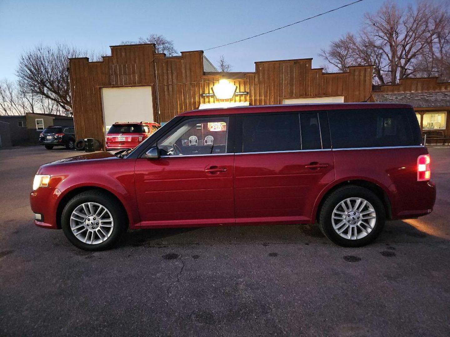 2014 MAROON FORD FLEX SEL (2FMHK6C81EB) with an 3.5L engine, Automatic transmission, located at 495 Old Highway 20 West, South Sioux City, NE, 68776, (402) 494-2677, 42.458408, -96.443512 - Photo#1