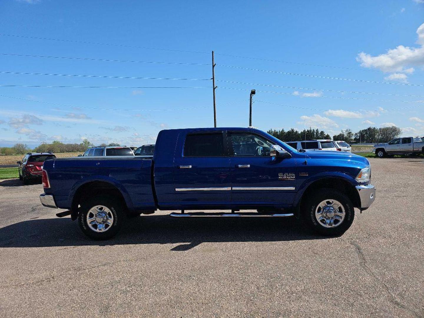 2015 BLUE RAM 2500 LARAMIE (3C6UR5NJ8FG) with an 6.4L engine, Automatic transmission, located at 495 Old Highway 20 West, South Sioux City, NE, 68776, (402) 494-2677, 42.458408, -96.443512 - Photo#4