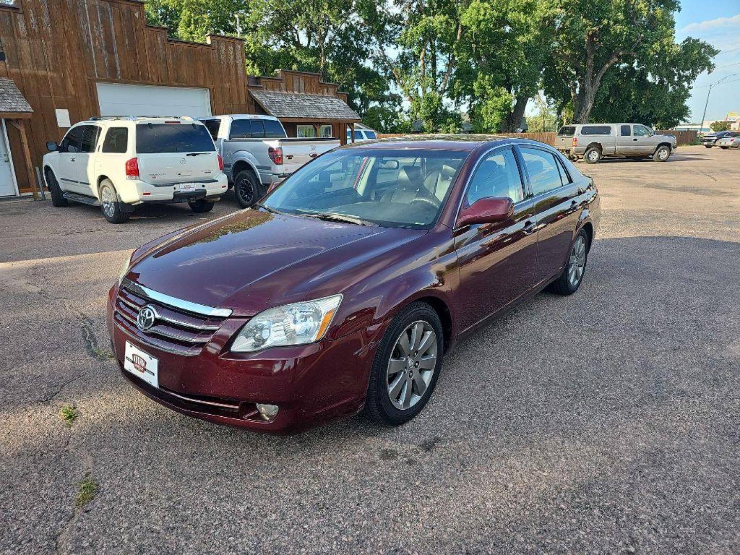 2007 MAROON TOYOTA AVALON XL (4T1BK36BX7U) with an 3.5L engine, Automatic transmission, located at 495 Old Highway 20 West, South Sioux City, NE, 68776, (402) 494-2677, 42.458408, -96.443512 - Photo#0