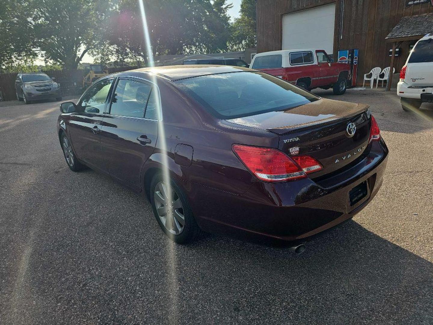 2007 MAROON TOYOTA AVALON XL (4T1BK36BX7U) with an 3.5L engine, Automatic transmission, located at 495 Old Highway 20 West, South Sioux City, NE, 68776, (402) 494-2677, 42.458408, -96.443512 - Photo#2