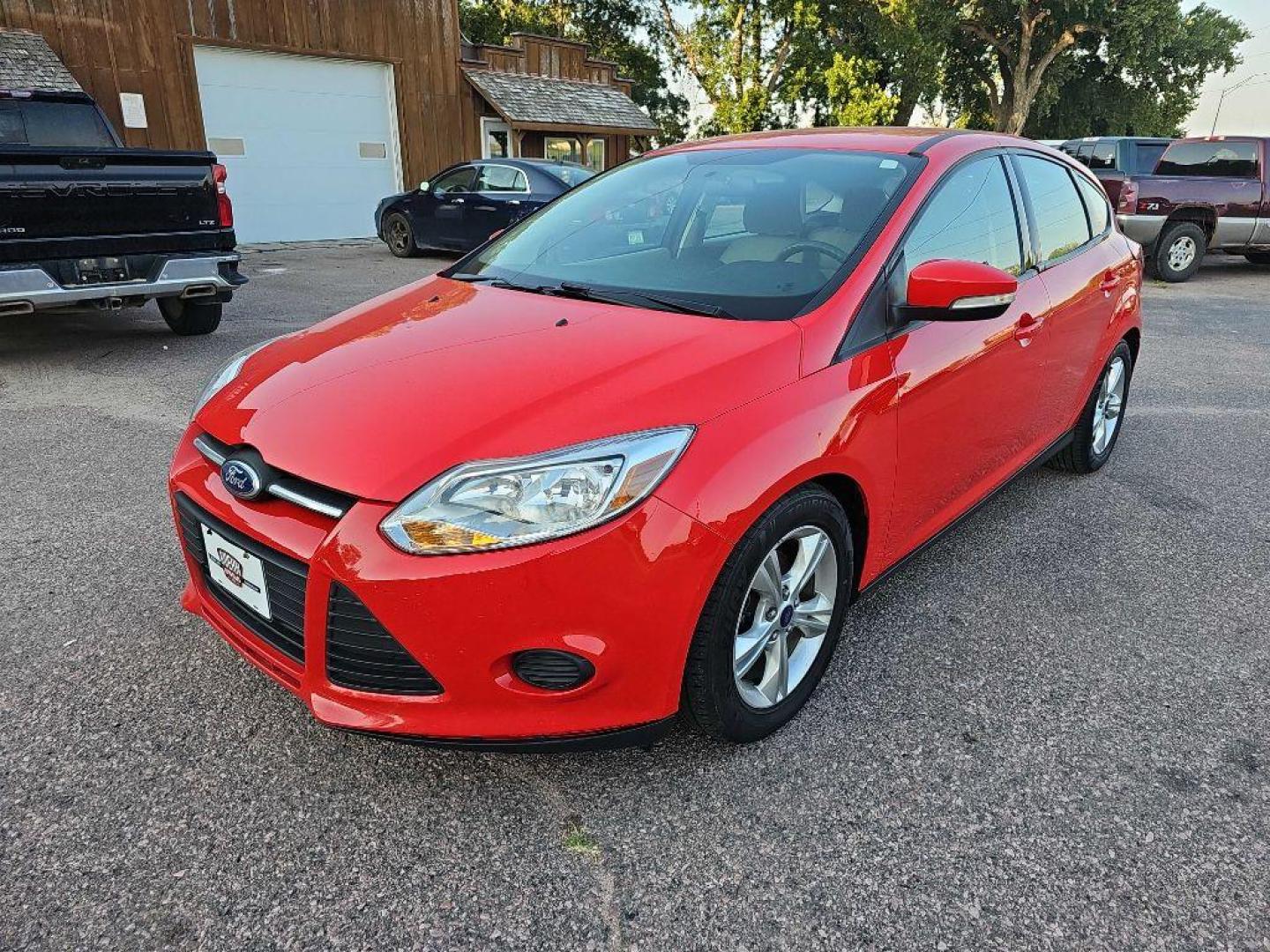 2014 RED FORD FOCUS SE (1FADP3K22EL) with an 2.0L engine, Automatic transmission, located at 495 Old Highway 20 West, South Sioux City, NE, 68776, (402) 494-2677, 42.458408, -96.443512 - Photo#0