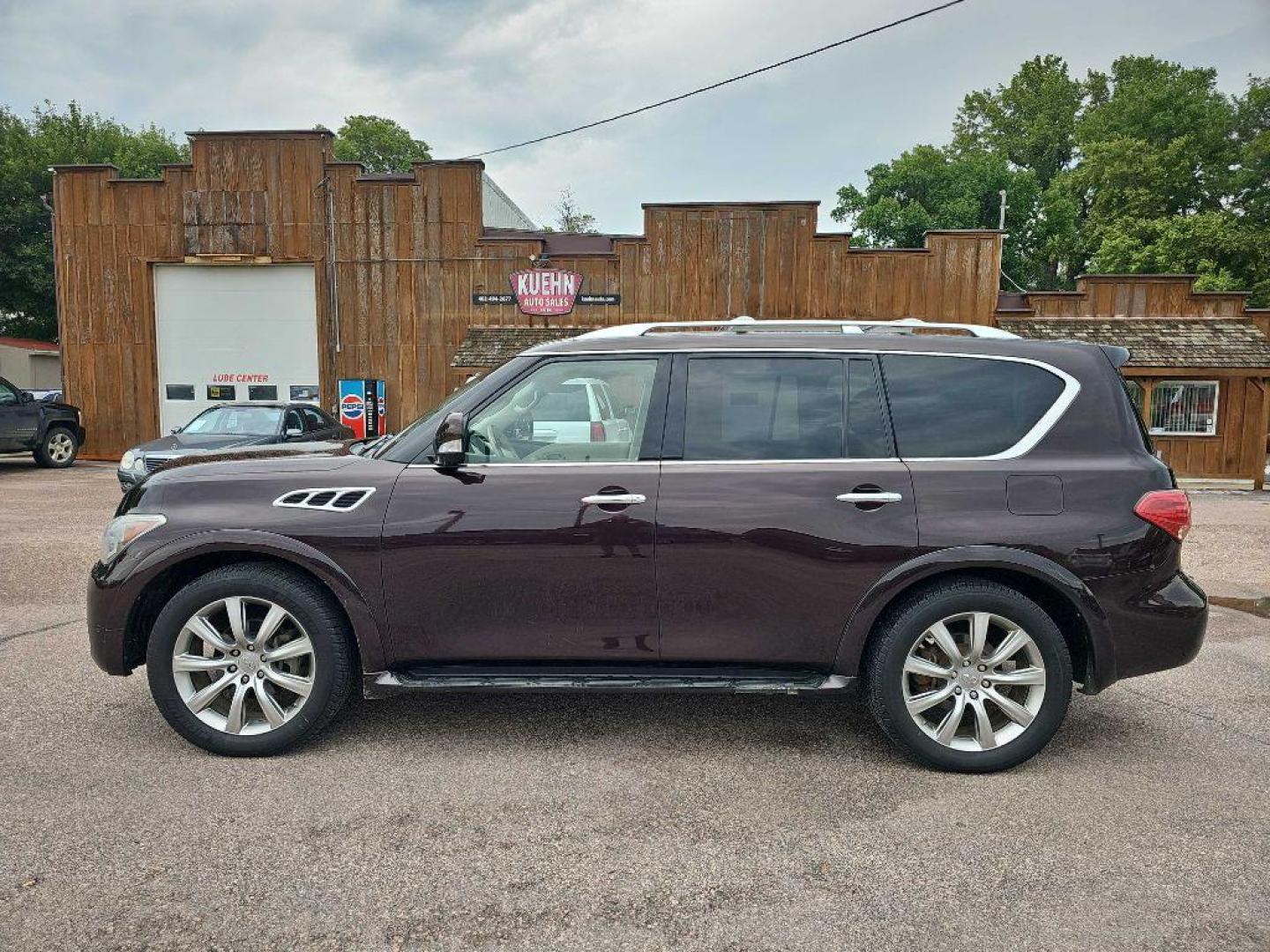 2012 MAROON INFINITI QX56 (JN8AZ2NE1C9) with an 5.6L engine, Automatic transmission, located at 495 Old Highway 20 West, South Sioux City, NE, 68776, (402) 494-2677, 42.458408, -96.443512 - Photo#1