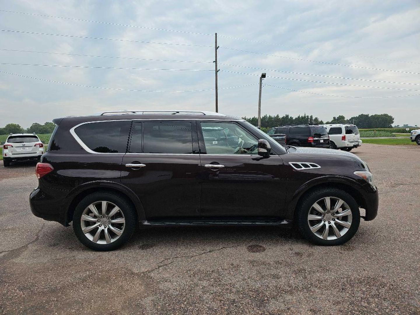 2012 MAROON INFINITI QX56 (JN8AZ2NE1C9) with an 5.6L engine, Automatic transmission, located at 495 Old Highway 20 West, South Sioux City, NE, 68776, (402) 494-2677, 42.458408, -96.443512 - Photo#4