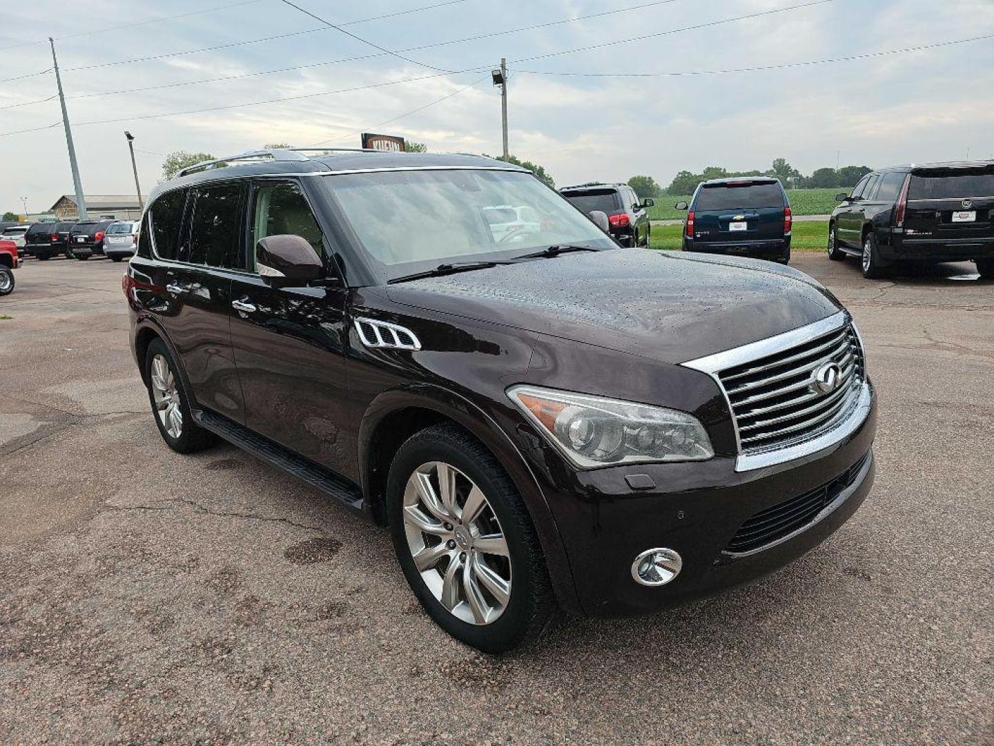 2012 MAROON INFINITI QX56 (JN8AZ2NE1C9) with an 5.6L engine, Automatic transmission, located at 495 Old Highway 20 West, South Sioux City, NE, 68776, (402) 494-2677, 42.458408, -96.443512 - Photo#5