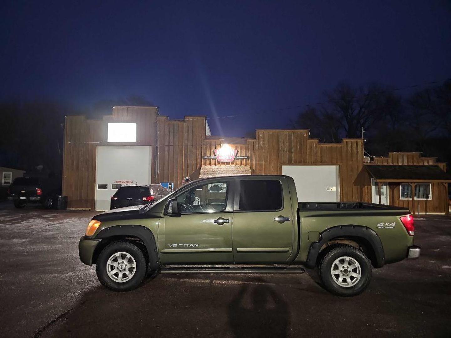 2005 GREEN NISSAN TITAN XE (1N6AA07B95N) with an 5.6L engine, Automatic transmission, located at 495 Old Highway 20 West, South Sioux City, NE, 68776, (402) 494-2677, 42.458408, -96.443512 - Photo#1