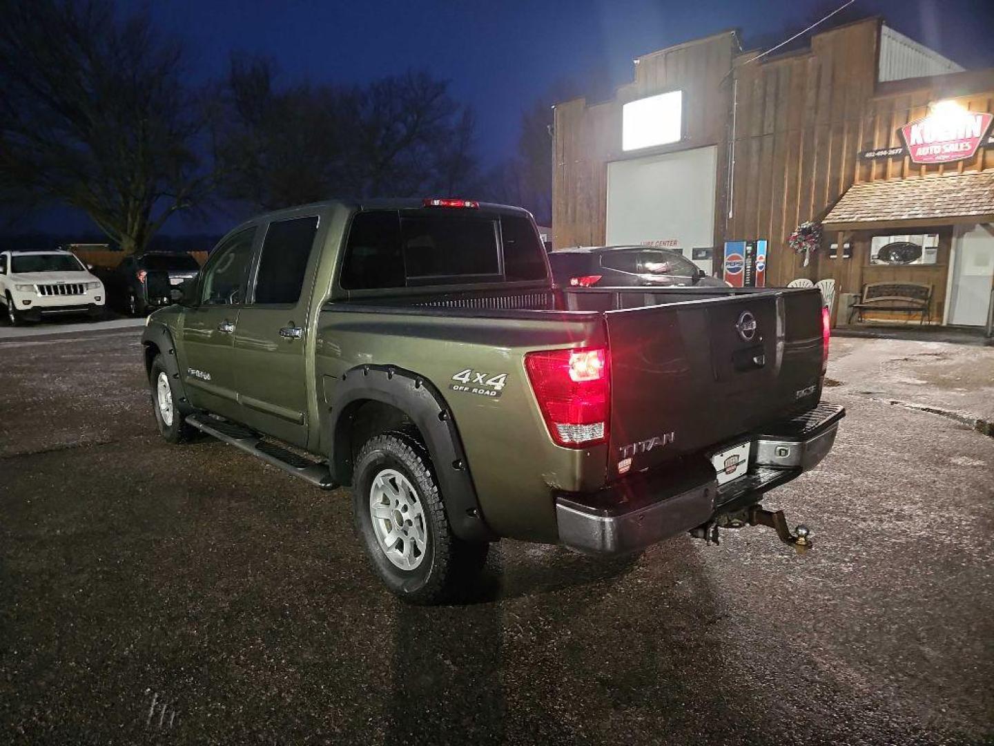 2005 GREEN NISSAN TITAN XE (1N6AA07B95N) with an 5.6L engine, Automatic transmission, located at 495 Old Highway 20 West, South Sioux City, NE, 68776, (402) 494-2677, 42.458408, -96.443512 - Photo#2