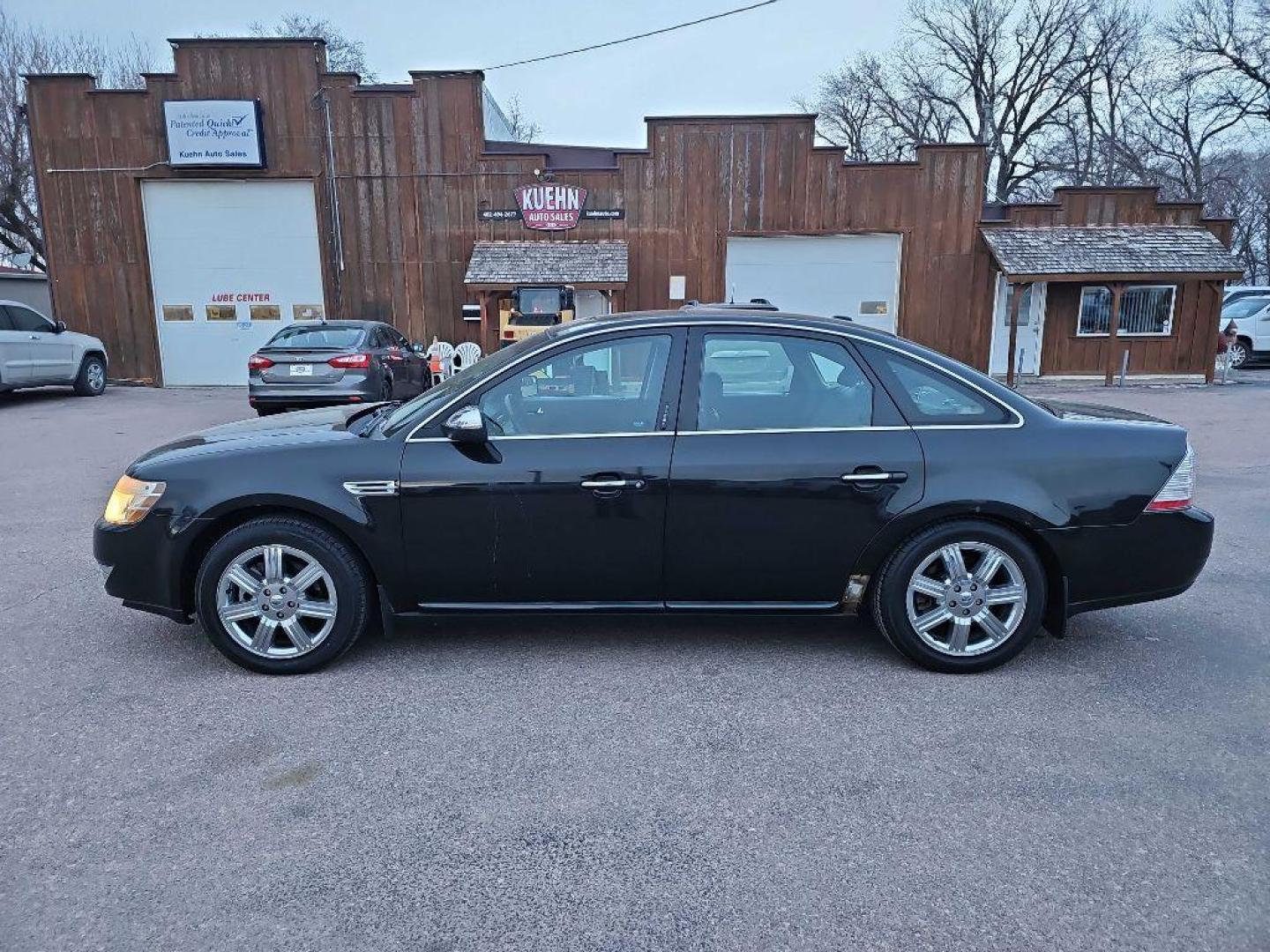 2009 BLACK FORD TAURUS LIMITED (1FAHP25W09G) with an 3.5L engine, Automatic transmission, located at 495 Old Highway 20 West, South Sioux City, NE, 68776, (402) 494-2677, 42.458408, -96.443512 - Photo#1