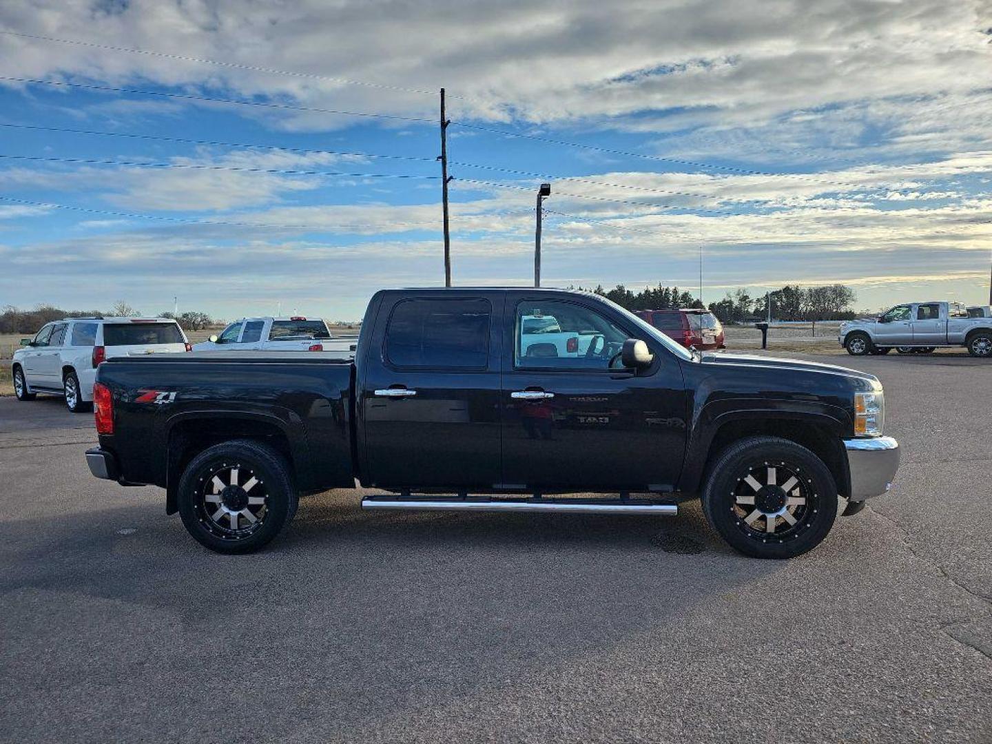 2012 BLACK CHEVROLET SILVERADO 1500 LT (1GCPKSE70CF) with an 5.3L engine, Automatic transmission, located at 495 Old Highway 20 West, South Sioux City, NE, 68776, (402) 494-2677, 42.458408, -96.443512 - Photo#4