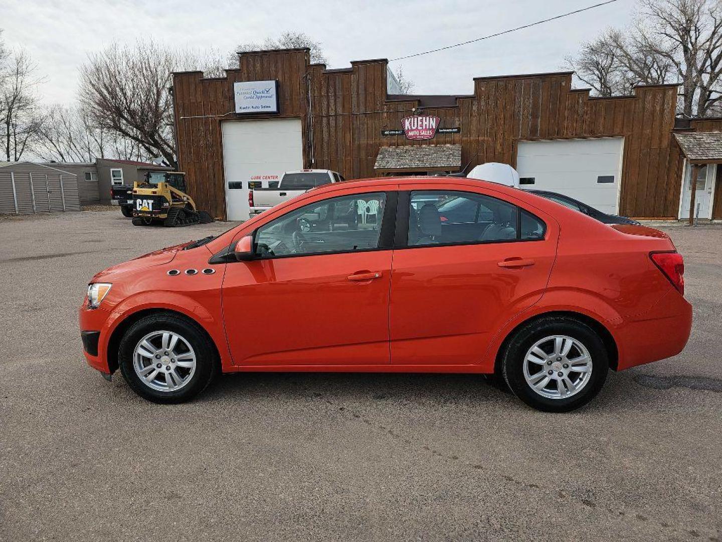 2012 ORANGE CHEVROLET SONIC LS (1G1JA5SHXC4) with an 1.8L engine, Automatic transmission, located at 495 Old Highway 20 West, South Sioux City, NE, 68776, (402) 494-2677, 42.458408, -96.443512 - Photo#1