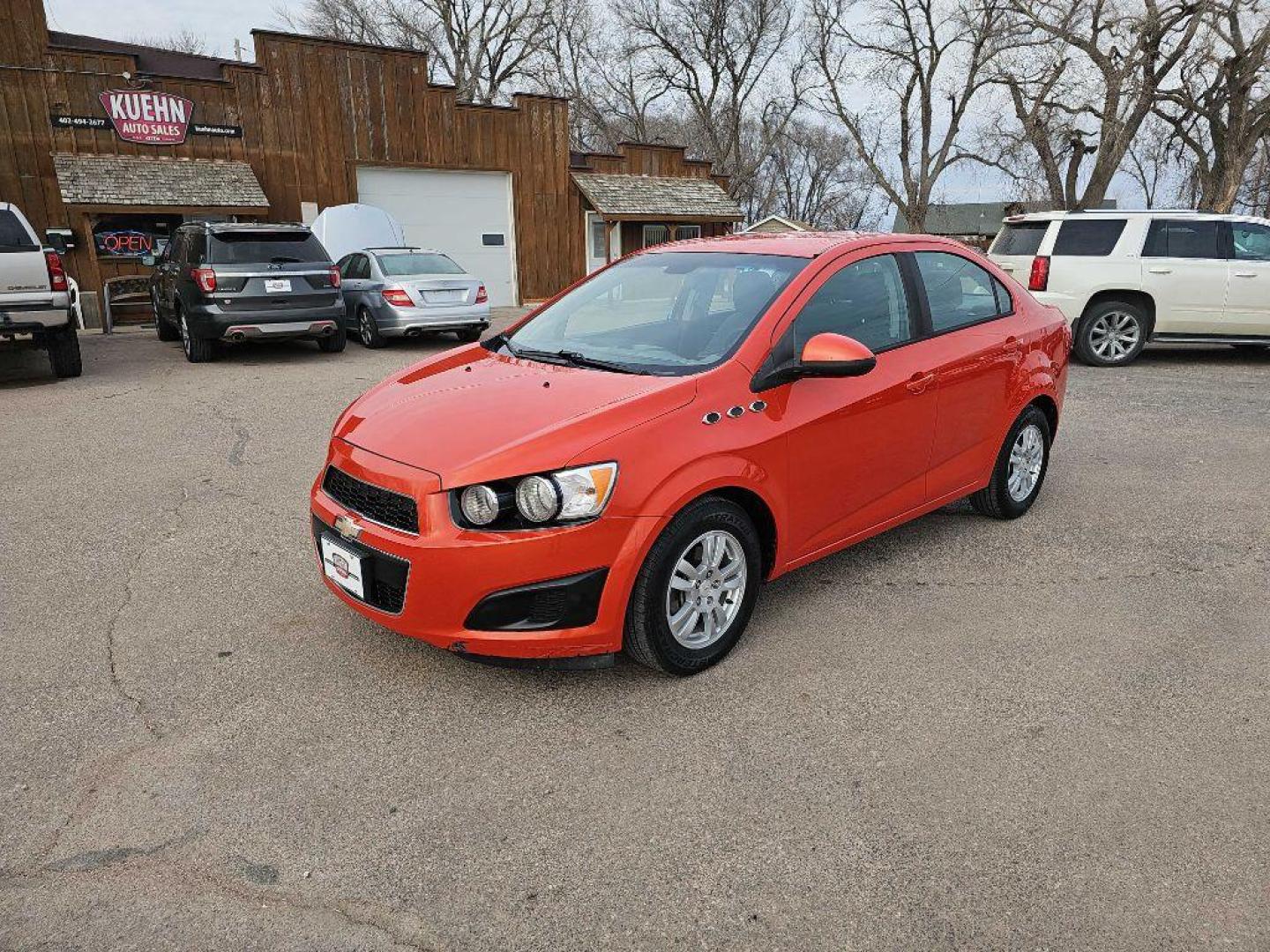 2012 ORANGE CHEVROLET SONIC LS (1G1JA5SHXC4) with an 1.8L engine, Automatic transmission, located at 495 Old Highway 20 West, South Sioux City, NE, 68776, (402) 494-2677, 42.458408, -96.443512 - Photo#0